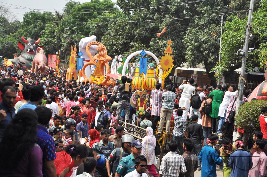 People celebrating in a colorful parade on the streets as a part of New year celebrations