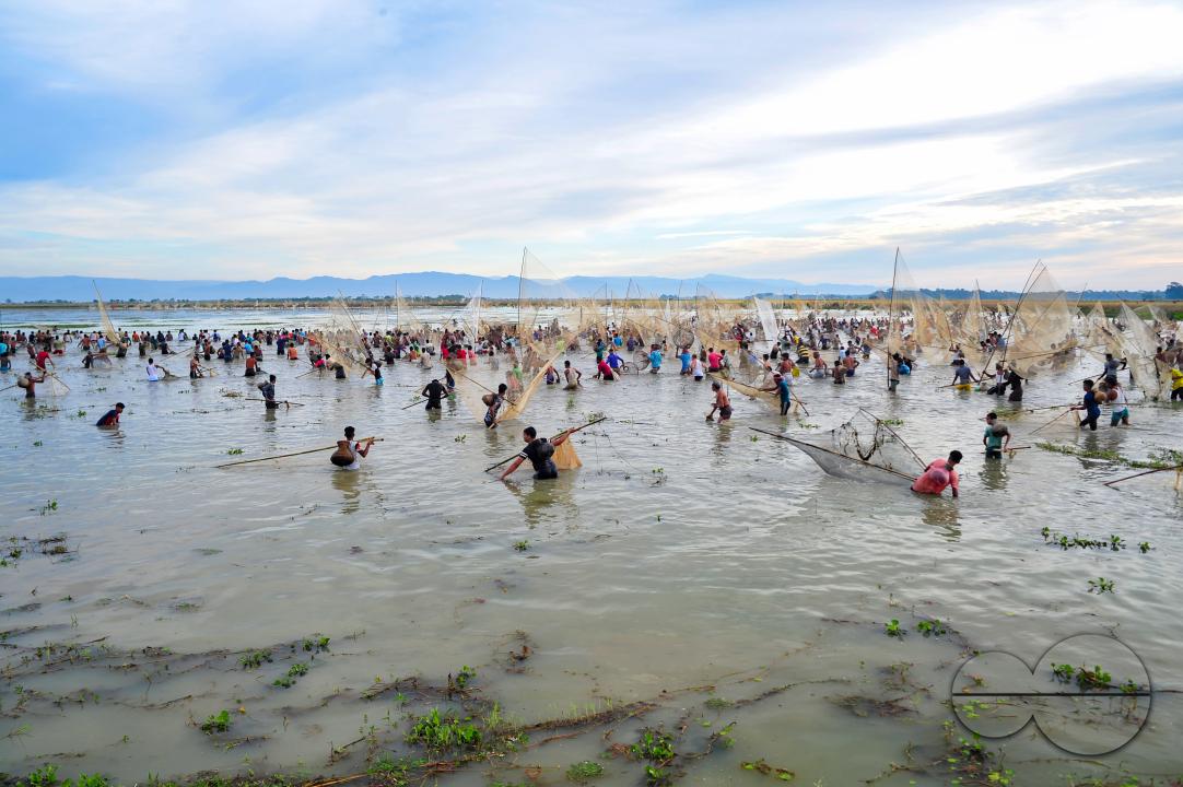 Rural people armed with Bamboo fish traps and nets take part in celebrating a 200-year winter fishing festival at the jofra beel of gasbari union of Kanaighat upazila of Sylhet, Bangladesh.