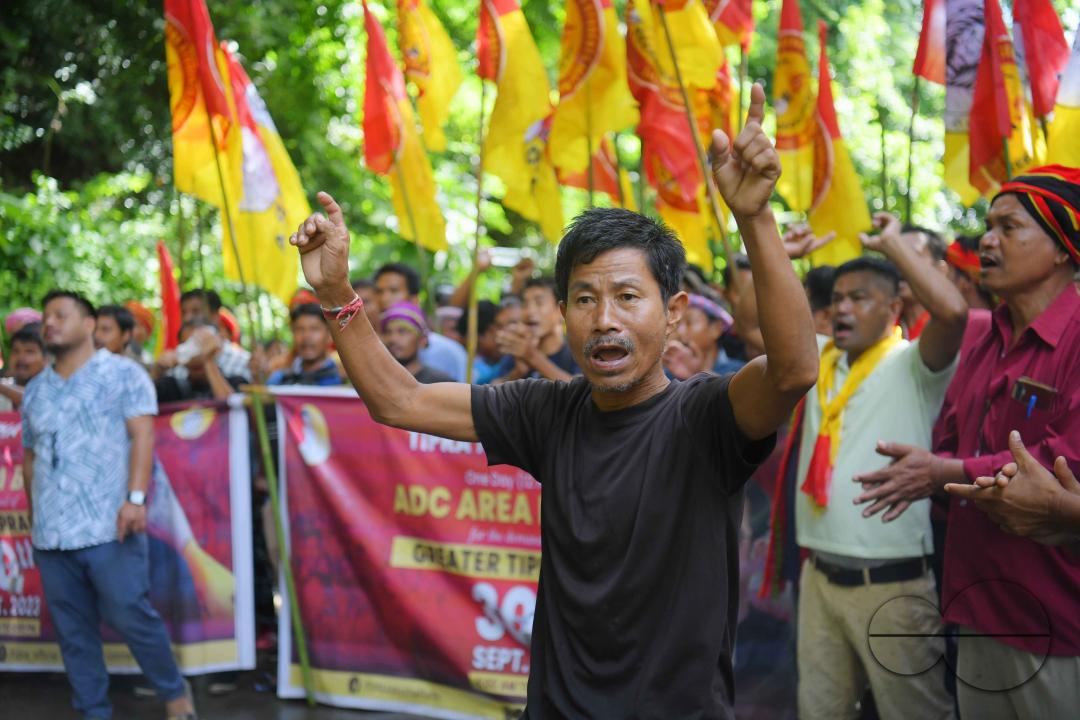 The âTipraha Indigenous Progressive Regional Alliance (TIPRA)ââ supporters raise slogans demanding a separate Greater Tipraland state for tribals, in Bermuda Ashram Para