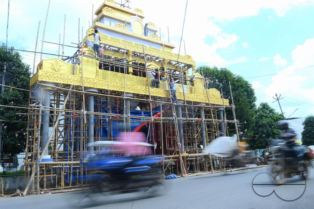 Workers are making a pandal, a temporary structure set up to usually venerate the God and Goddess, ahead of Ganesh Chaturthi festival in Agartala