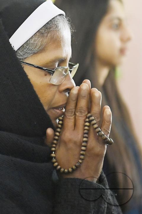 Christians attend a Christmas Mass in Mariam Nagar Church at Agartala
